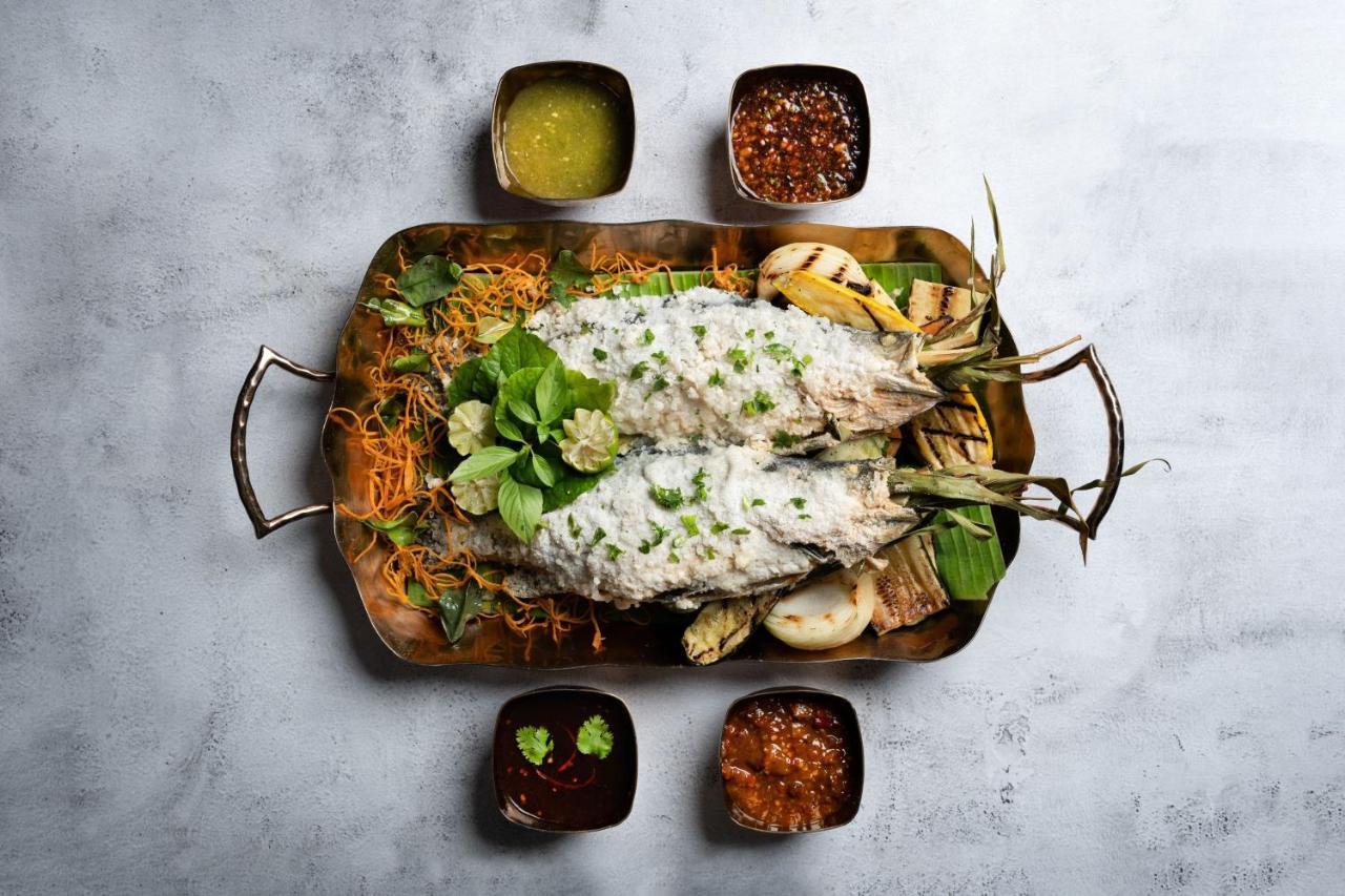 Hotel The Ritz-Carlton, Kuala Lumpur Zewnętrze zdjęcie A dish of Thai-style grilled grouper